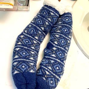 Navy blue, white, light green fuzzy socks.